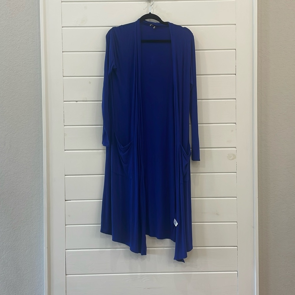 Brand New Condition Cardigan. Smoke free, pet free home.